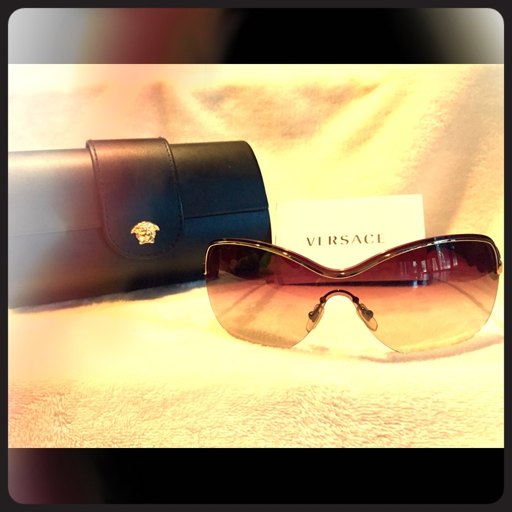 Versace sunglasses.  Brand new, never used.